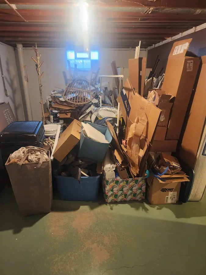 Roll-off dumpster container at job site for Concrete Dumpster Rental in Champion Heights